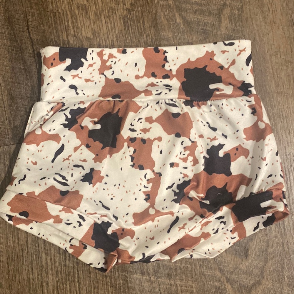 Baby 6-9 month cow print bottoms.
